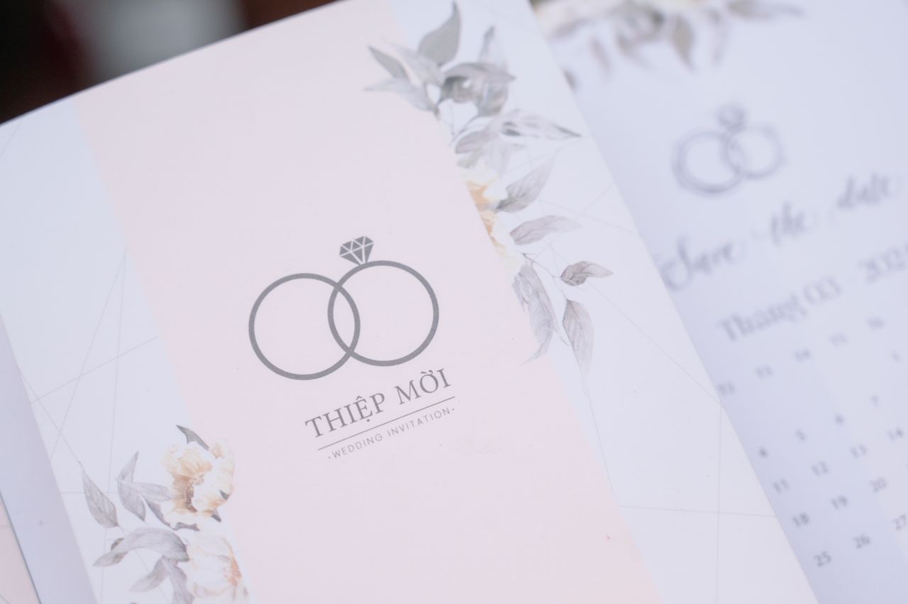 A beautifully designed floral wedding invitation with subtle pastel colors and elegant typography.